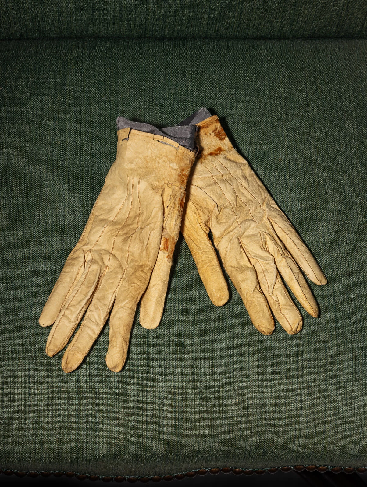 A pair of dirty glovesAI-generated content may be incorrect.