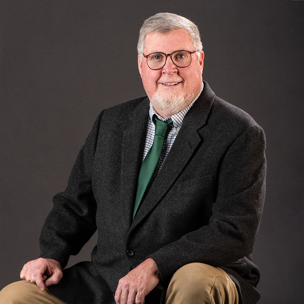 Mr. Tim Carey