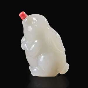 A Chinese carved white jade 