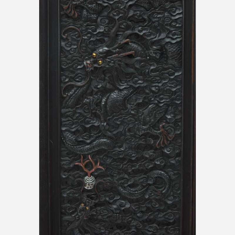 A Chinese carved hardwood six-panel “Dragons” screen 硬木浮雕龙纹