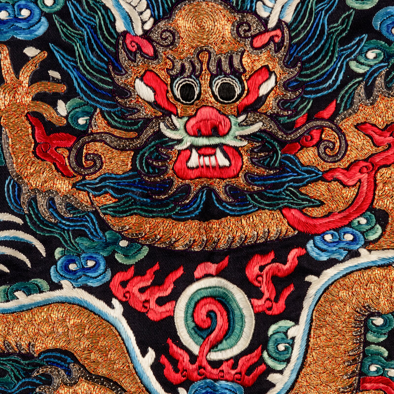 A Chinese Navy Satin Ground Embroidered Silk 'Dragon and