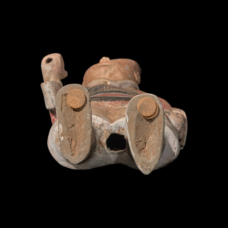 A Chinese Painted Pottery Figure of a Standing Warrior