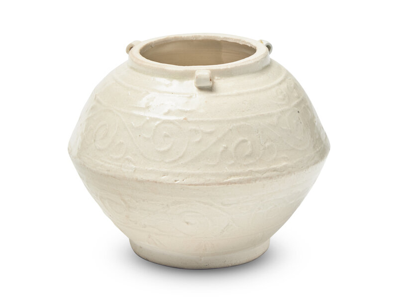A Chinese White Glazed Molded Whiteware Jar Lot 23