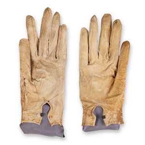 [LINCOLN ASSASSINATION]. A pair of stained leather gloves carried by President Abraham Lincoln at Ford's Theatre on the night of his assassination, 14 April 1865. 